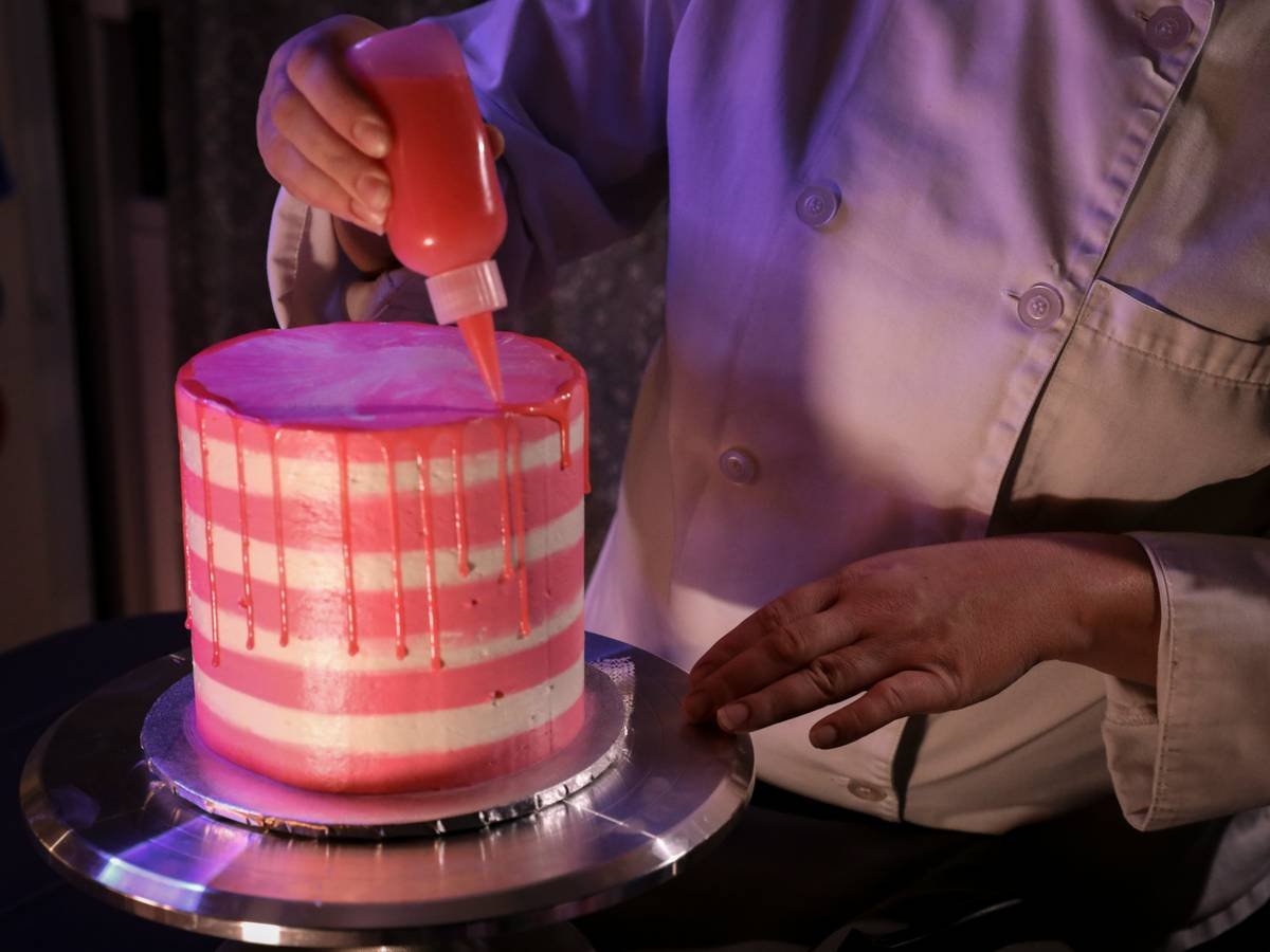 Before: uneven hand-painted cake; After: smooth, gradient airbrushed cake with sharp stencil details
